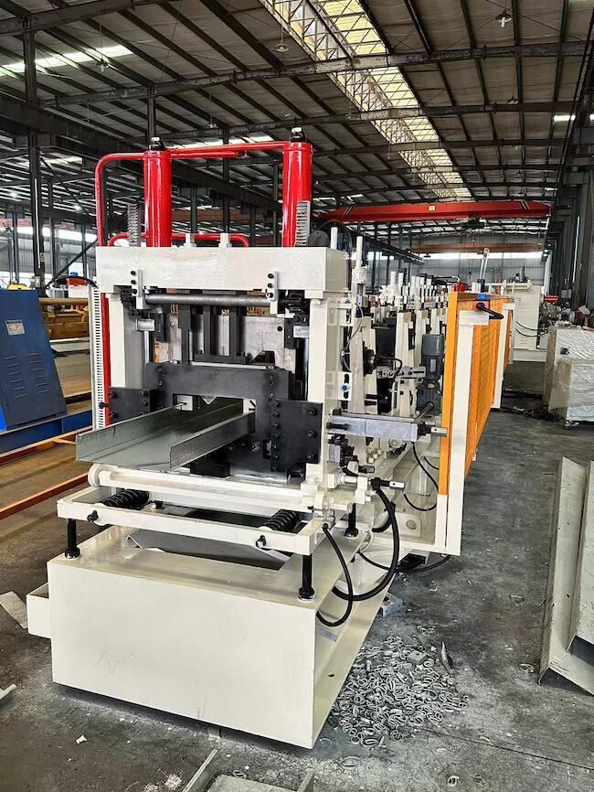 IMG_1422_f0f5b85f1983de3f758c2bfa67a0bf0b C&Z Purlin Forming Machine