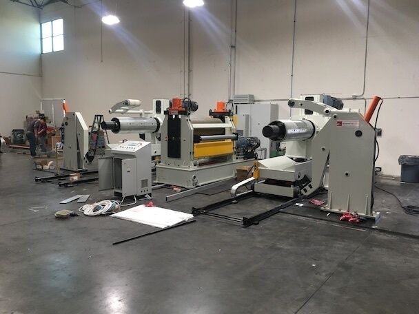 IMG_8426_f0f5b85f1983de3f758c2bfa67a0bf0b Coil Embosser Machine